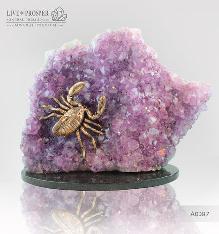 Bronze scorpion figure with demantoid inserts with agate geode amethyst on dolerite plate