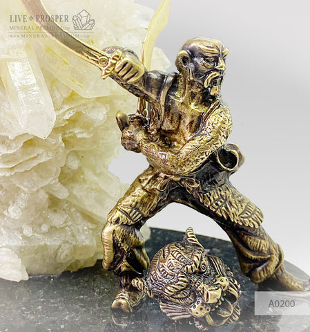 Bronze Samurai the Sky guardian with calcite on a dolerite plate and color led system  A0200